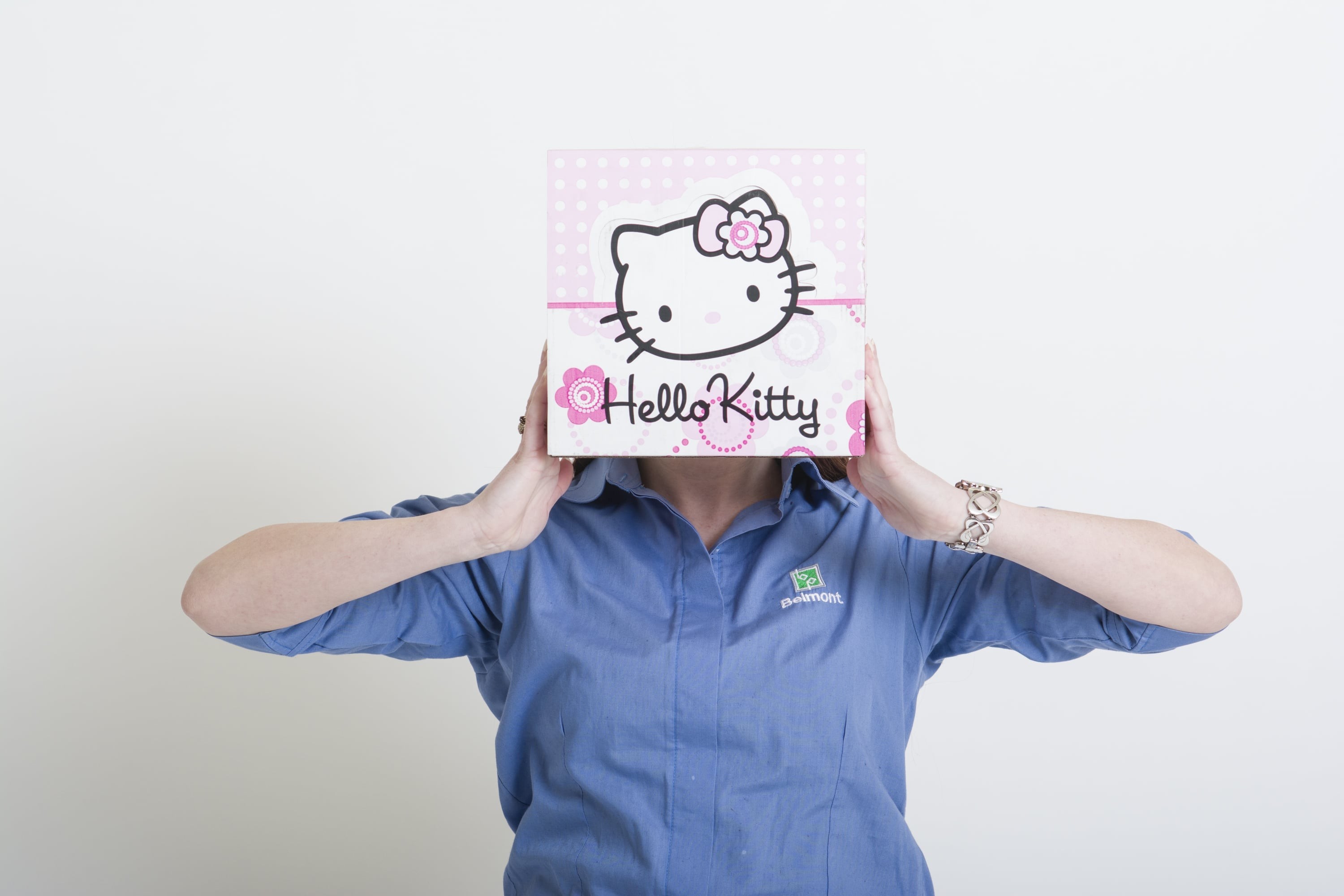 Hello Kitty branded and printed box held by Belmont staff member 