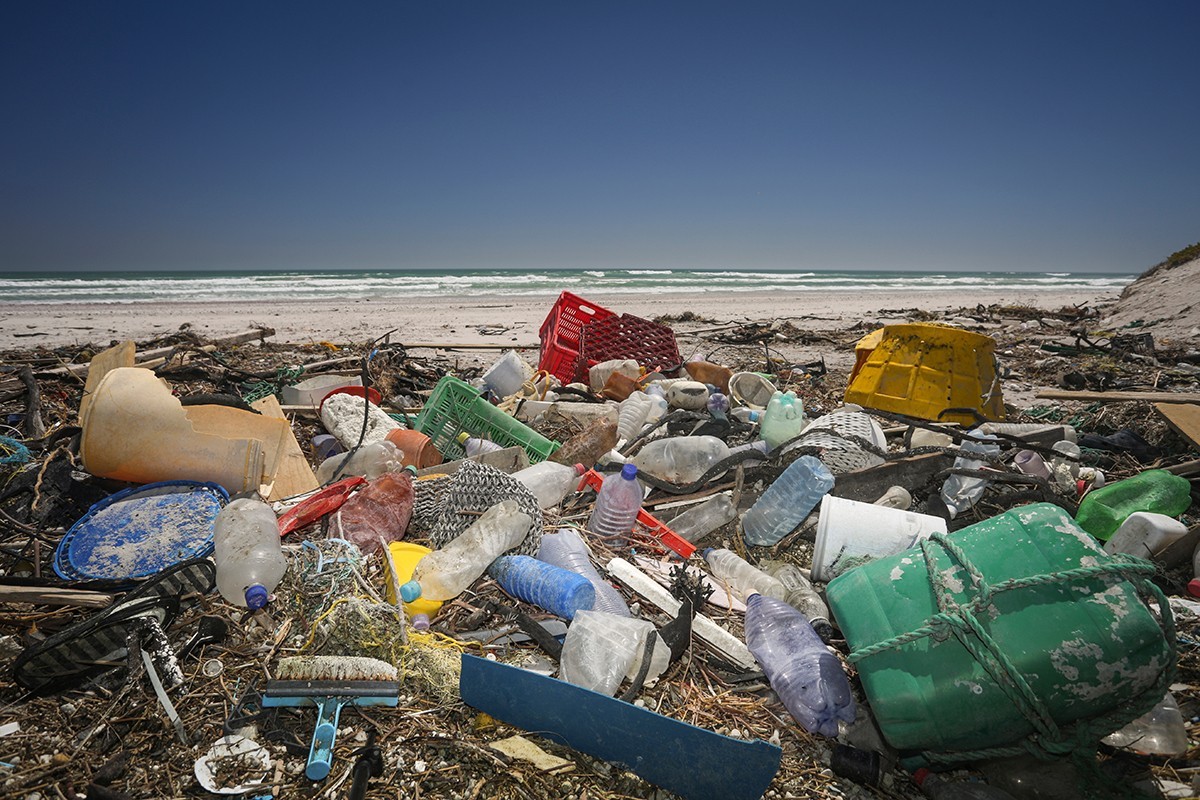 Stock Photograph Showing A Rubbish Laden Beach